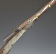 Indian or Afghan matchlock rifle with pierced decoration to the metal plates, brass barrel bands,