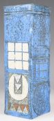Troika pottery rectangular vase with carved and incised decoration in colours against a blue ground,