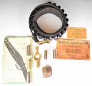 A collection of gun and shooting related accessories James Purdey & Sons cartridge belt and oil