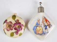 Two perfume or scent bottles with decoration of a lady and beau and a circular example, probably