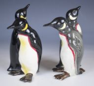 Two Beswick courting penguins figures in black colourway and grey colourway, height 12cm