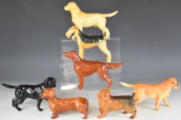 Seven Beswick dogs including Red Setter, Dachshund, Labradors etc