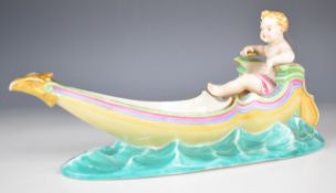 Royal Worcester majolica figural sweetmeat dish modelled as a boat with putti at the tiller, with