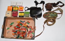 Over 250 mainly 10 and 12 bore shotgun cartridges some in Loadmaster speed loader, cartridge belt,