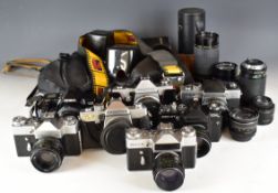 Seven 35mm SLR cameras comprising Praktica VLC2 with 35mm 1:2.8 lens, Praktica TL3 with Takumar 1: