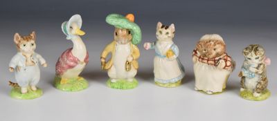 Six Beswick Beatrix Potter figures including four special edition examples with gold details and