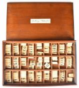 Georgian or Victorian bone spelling alphabet comprising between three and eight tiles for each