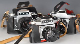 Three Ihagee SLR cameras comprising Exakta Varex IIb with 2/50 lens, Exa 500 with 2.8/50 lens and