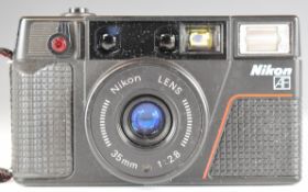 Nikon L35 AF 2 35mm camera outfit, in original carry case with accessories, manuals and original