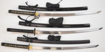 Three Japanese Katana Samurai swords each with gilt decorated tsuba and kashira, bound shagreen