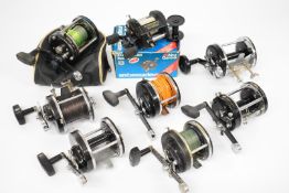 Eight Abu Ambassadeur multiplier fishing reels comprising two 8000C, two 9000C, two 7000C, a 10,