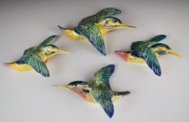 Beswick set of four flying kingfisher wall plaques, flying left and right, longest 18cm