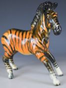 Beswick figure of a zebra, orange colourway, height 18cm