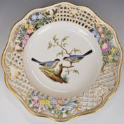 Augustus Rex / Dresden reticulated cabinet plate decorated with two birds and flower surround,