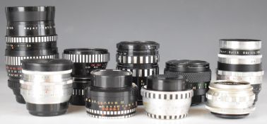 Nine screw mount camera lenses comprising Mamiya Sekor 1:1.8 f=55mm, Enna Lithagon 1:4/24mm,