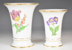 Two Meissen flared vases with tulip and aricula decoration, tallest 17cm