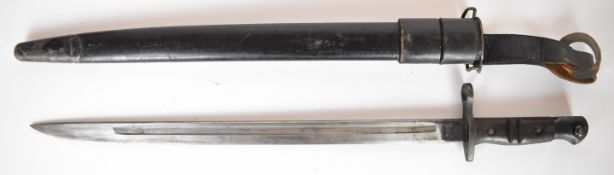 American WW1 bayonet with good stamps to ricasso, 43cm fullered blade, scabbard and frog dated 1940.