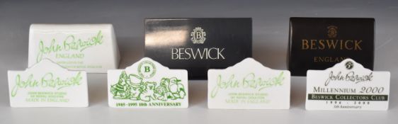 Seven Beswick point of sale advertising plaques including Millennium 2000 and BCC Beswick
