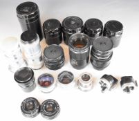 Eleven Russian mainly screw mount Leica copy and similar camera lenses, to include 1:3.5 f-5cm,