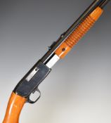 Browning .22 pump-action rifle with semi-pistol grip, adjustable sights and 21.5 inch barrel,