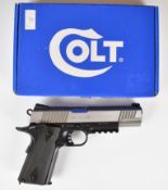 Cybergun Colt 1911 6mm CO2 airsoft pistol with chequered faux wooden grips, multi-shot magazine