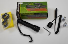 Remington Flashlight Tact LED gun lamp, in original box.