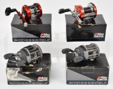 Four Abu Ambassadeur multiplier fishing reels comprising 6600D5 SW, 6500C3 CT Mag Hi-Speed and two