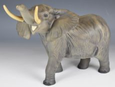 Beswick large African elephant figure with raised trunk, in matt finish, height 26cm