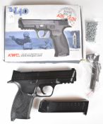 KWC M40 .177 CO2 airsoft pistol with textured grips, multi-shot magazine and fixed sights, serial
