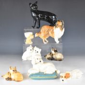 Collection of Beswick dog and cat figures including black Siamese facing left, poodle on a cushion