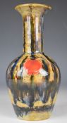 Cobridge pottery vase with drip glaze and sunspot decoration, height 18cm