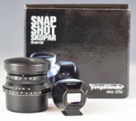 Voigtlander Shot Skopar 25mm f:4.0 lens, in original box with viewfinder attachment