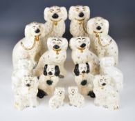 Seven pairs of Beswick Staffordshire style spaniels, tallest 23cm