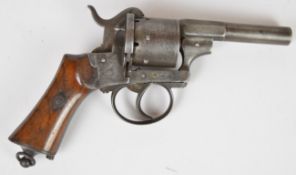 Belgian six-shot pinfire double-action revolver with shaped wooden grips, belt loop and 3.25 inch