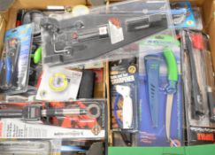 Large quantity of mainly unopened sea fishing accessories in two trays, including Rapala filleting