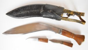 WW2 era kukri knife with wooden grip, 31cm blade, leather scabbard with belt attachments and karda