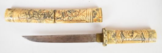 Japanese Tanto Samurai dagger with carved bone handle and scabbard and 16cm blade. PLEASE NOTE ALL