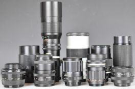 Ten screw mount camera lenses comprising Pentacon 1.8/50, Palar 135mm 1:2.8, Takumar 1:2.8/105, Hoya