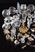 Approximately fifty Swarovski Crystal Memories and similar glass items, mainly animals but with some