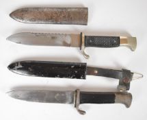 Two Hitler Youth style daggers one with 14cm serrated blade, marked Solingen to blade, the other