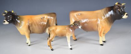 Beswick Jersey bull, cow and calf figures, tallest 12cm