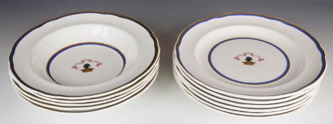 Eleven Copeland armorial dinner and soup plates with hand decorated family crest for the Moore