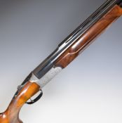 Sabatti Trap 12 bore over under ejector shotgun with engraved lock, underside, top plate, trigger