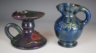 Elton Ware pottery chamberstick and jug with floral decoration in relief, Worlock Collection