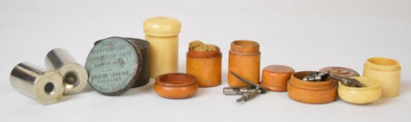 Eight gun case accessories including turned wood and faux ivory boxes some containing parts, Eley