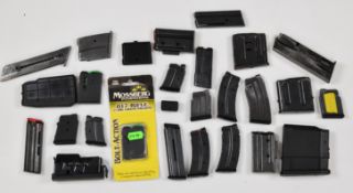 Twenty-six various rifle magazines including Savage .243, Mossburg .17 HMR, .22 LR etc.  PLEASE NOTE