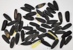 Fifty various shotgun and rifle recoil butt pads.