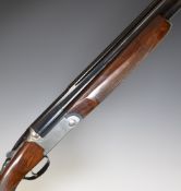 Italian 12 bore over and under ejector shotgun with engraved lock, underside, trigger guard, top