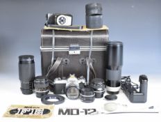Nikon FE 35mm SLR camera outfit including Nikon 50mm 1:1.4, 28mm 1:2.8 and 55mm 1:2.8 lenses, Tokina