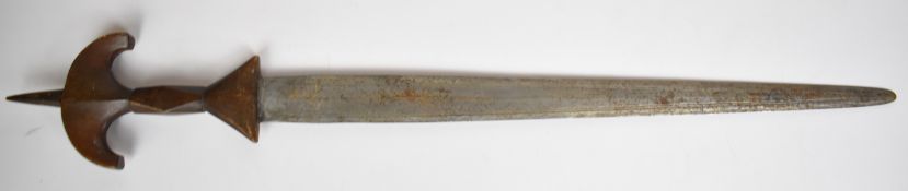 African short sword with wooden hilt and 46cm crudely etched double edged blade. PLEASE NOTE ALL